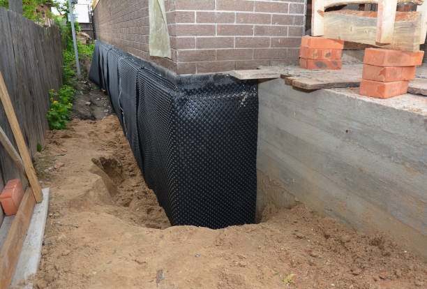 SJ Waterproofing Pros technician performing targeted Crawl Space Encapsulation assessment in Cambria, IL